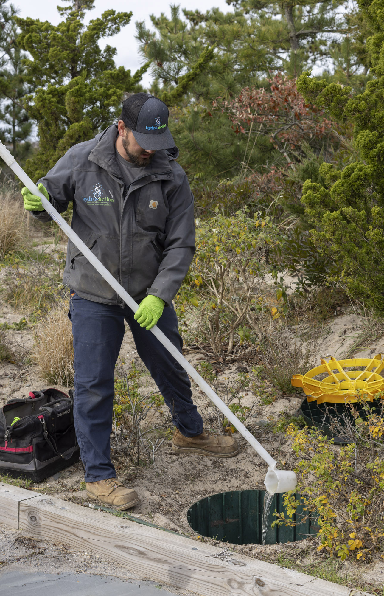 Technician servicing a wastewater system