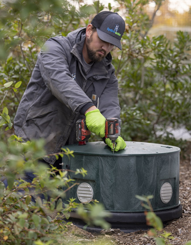 Technician working on a Hydro-Action system
